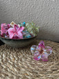 Pince fleur rose transparent